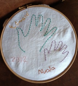embroidered childs hands